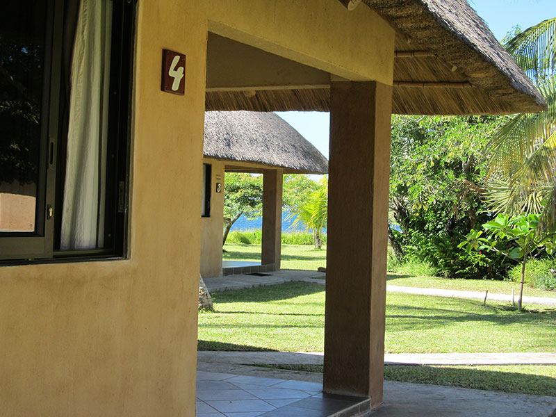 Double bedroom with king-size bed and mosquito net